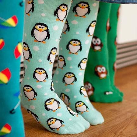 Christmas Penguin light blue patterned tights for all women 